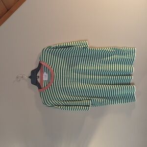 Never been worn tshirt, fits more like a xlarge